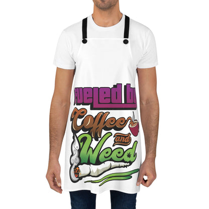 A person wears a white T-shirt and the "Fueled by Coffee and Weed Apron," featuring coffee cups, a lit joint, and a marijuana-themed design with the slogan "Fueled by Coffee and Weed.