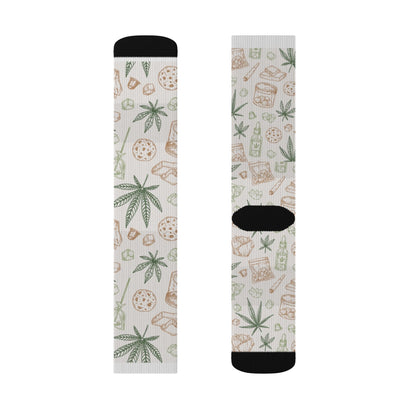 Retro Weed Socks showcase playful weed leaf, pizza, and cheeseburger patterns on a white background with black toes and heels—making them a fun and quirky 420 gift.