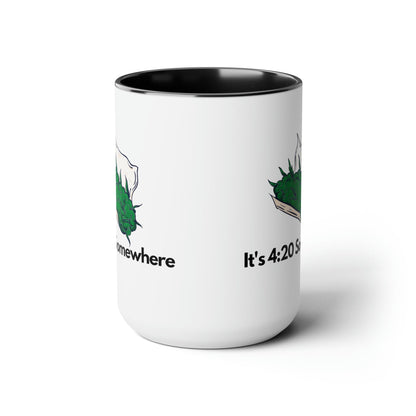 The It's 420 Somewhere 15oz Coffee Mug is a white ceramic mug with a sleek black interior