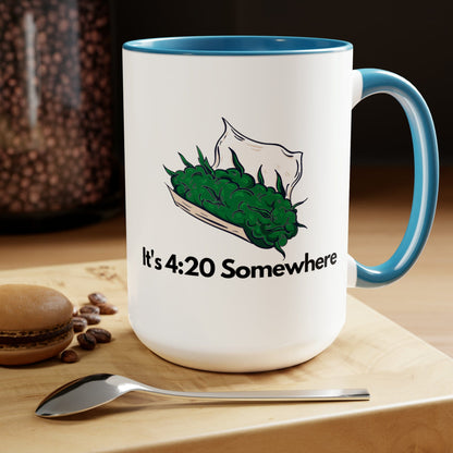 It's 420 Somewhere 15oz Coffee Mug is a ceramic mug that showcases a blue handle