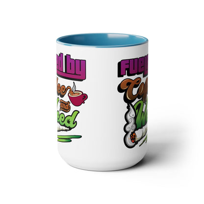 The Fueled by Coffee and Weed 15oz Coffee Mug features a white ceramic body, blue interior, colorful "Fueled by Coffee and Weed" text, coffee cup and joint graphics—perfect for your morning routine.