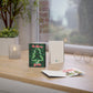 Be Merry Be Lit cards laying on window nook showing front back and inside design.