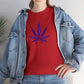 A person wearing a vibrant color Purple Cannabis Leaf Tee, partially covered by an open denim jacket.