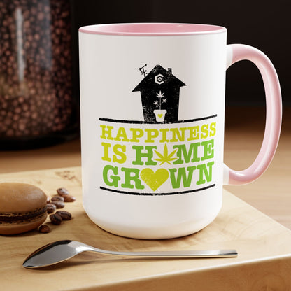 The "Happiness Is Homegrown Weed Coffee Mug" is a 15oz ceramic mug featuring a pink handle