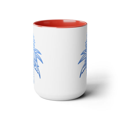 The Blue Dream Cannabis Coffee Mug is a white ceramic mug with a red interior and a blue palm tree design