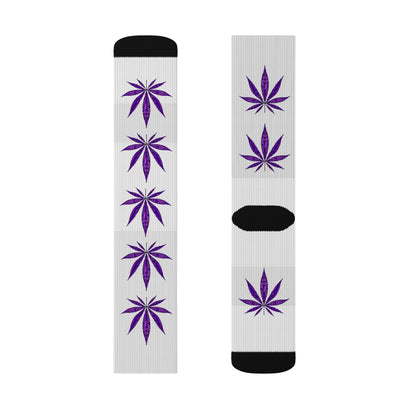 The Purple Haze Weed Socks are white crew socks with black toes and heels, featuring large purple cannabis leaves—offering bold style and comfort for standout everyday wear.