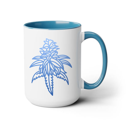 The Blue Dream Cannabis Coffee Mug is a white coffee mug with a blue interior and handle, adorned with a blue line drawing of a cannabis leaf 