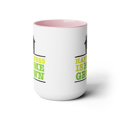 The "Happiness Is Homegrown Weed Coffee Mug" is a white ceramic cup featuring a pink interior 