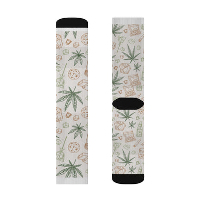 Retro Weed Socks feature a repeating pattern of green cannabis leaves and brown dice, plus black accents on the toes, heels, and cuffs—making them a fun 420 gift.