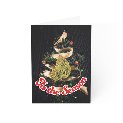 A Be Merry Be Lit Christmas greeting card featuring a cannabis 