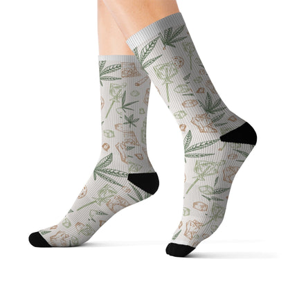 Retro Weed Socks: White socks with black toes and heels, featuring a green and brown leaf pattern—unique 420 gift for plant lovers.