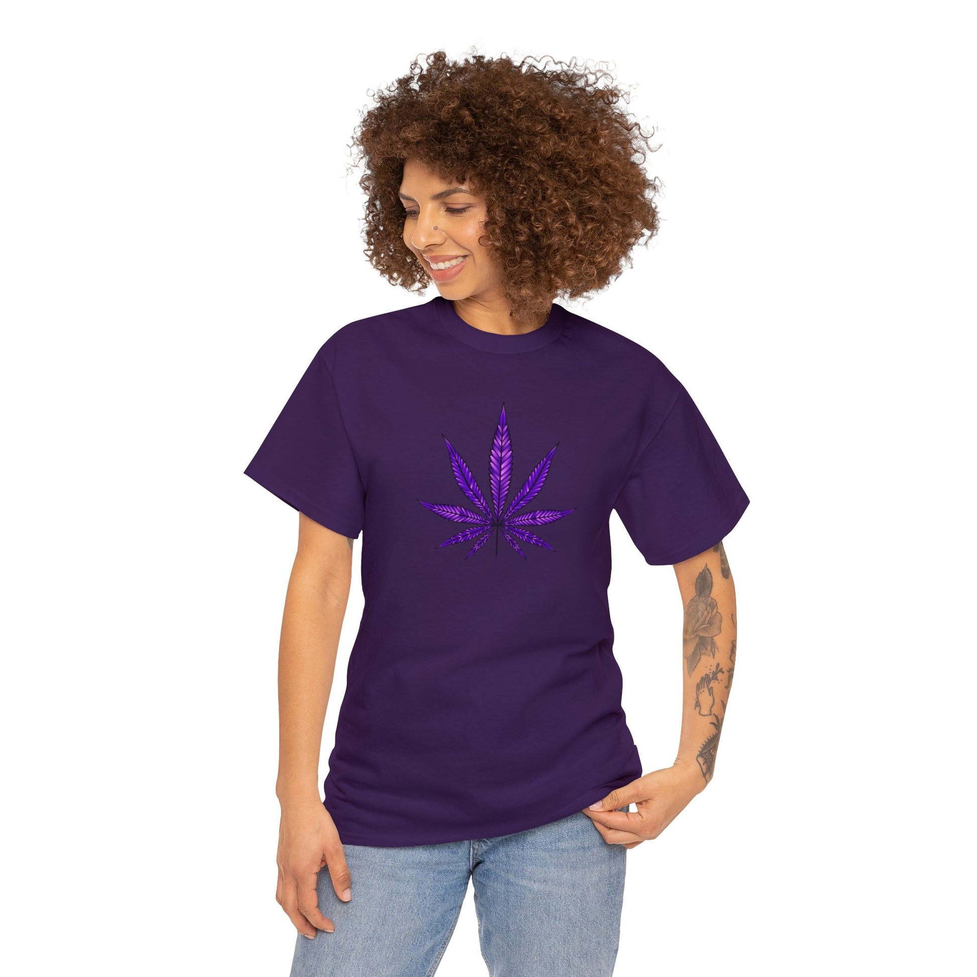 A person wearing a Sparkling Weed Leaf Tee with a graphic of a sparkling marijuana leaf design on the front.