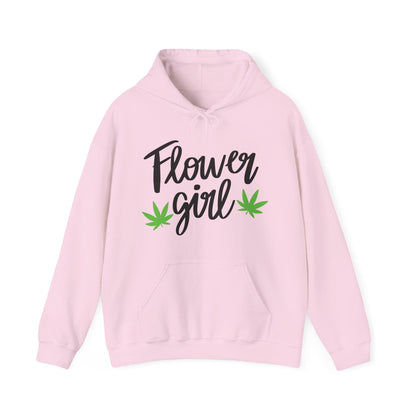 The Flower Girl Pot Leaf Hoodie is an ultra-soft light pink hoodie featuring "Flower Girl" in black with two green cannabis leaves beneath—ideal for flaunting your canna pride.
