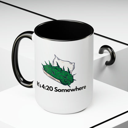 The "It's 420 Somewhere" 15oz Coffee Mug is a two-tone ceramic mug featuring a white surface and black handle