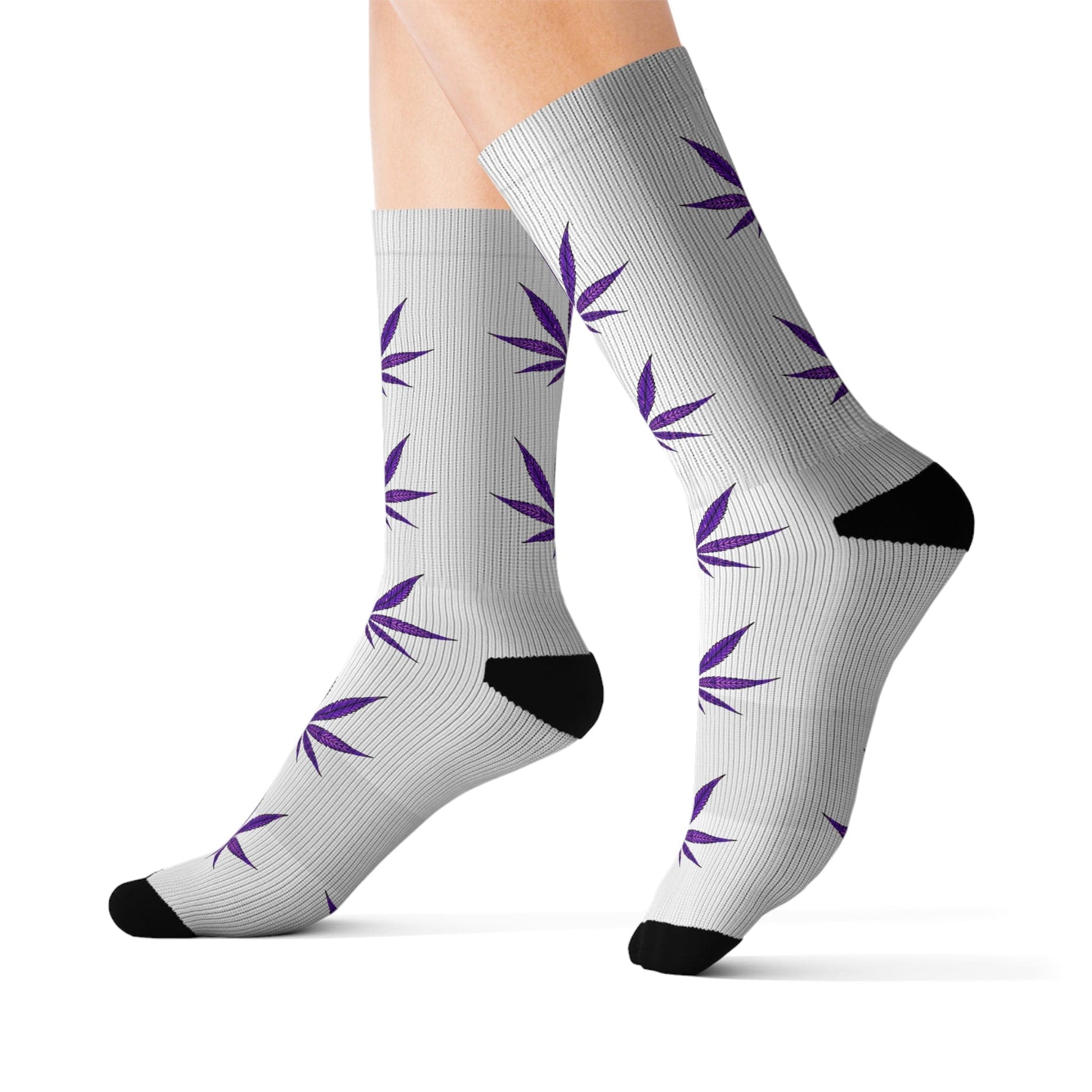 Show off your style and stay cozy with Purple Haze Weed Socks—gray crew socks with black heels and toes, finished with a playful purple cannabis leaf pattern.