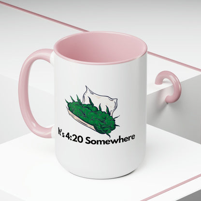 This 15oz coffee mug, named "It's 420 Somewhere," features a sleek white exterior contrasted by a pink handle and interior