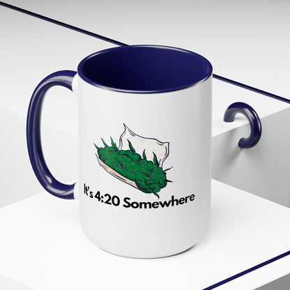 The "It's 420 Somewhere" 15oz Coffee Mug is a white two-tone design featuring a dark blue handle 