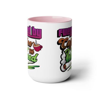 The Fueled by Coffee and Weed 15oz Coffee Mug is a white ceramic mug with a pink interior, featuring colorful text and illustrations of a coffee cup and joint, reading "Fueled by Coffee and Weed.