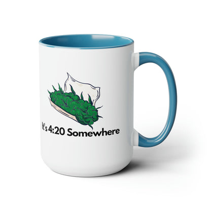 The "It's 420 Somewhere" 15oz Coffee Mug showcases a white and blue two-tone design