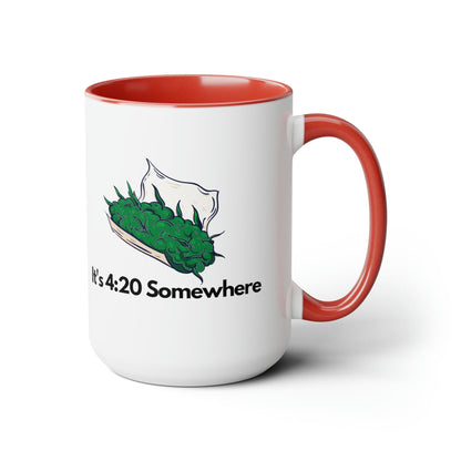 The "It's 420 Somewhere" 15oz coffee mug features a white exterior complemented by a striking red handle and interior