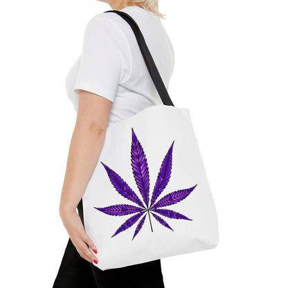 Person in a white shirt carrying a durable and spacious Purple Haze Marijuana Tote Bag adorned with a large purple cannabis leaf design.