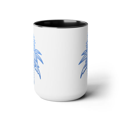 The Blue Dream Cannabis Coffee Mug is a white ceramic mug with a black interior and a blue palm tree illustration on the exterior