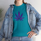 A person wearing a vibrant color, Purple Cannabis Leaf Tee, partially covered by an unbuttoned blue denim jacket, reflecting marijuana culture.
