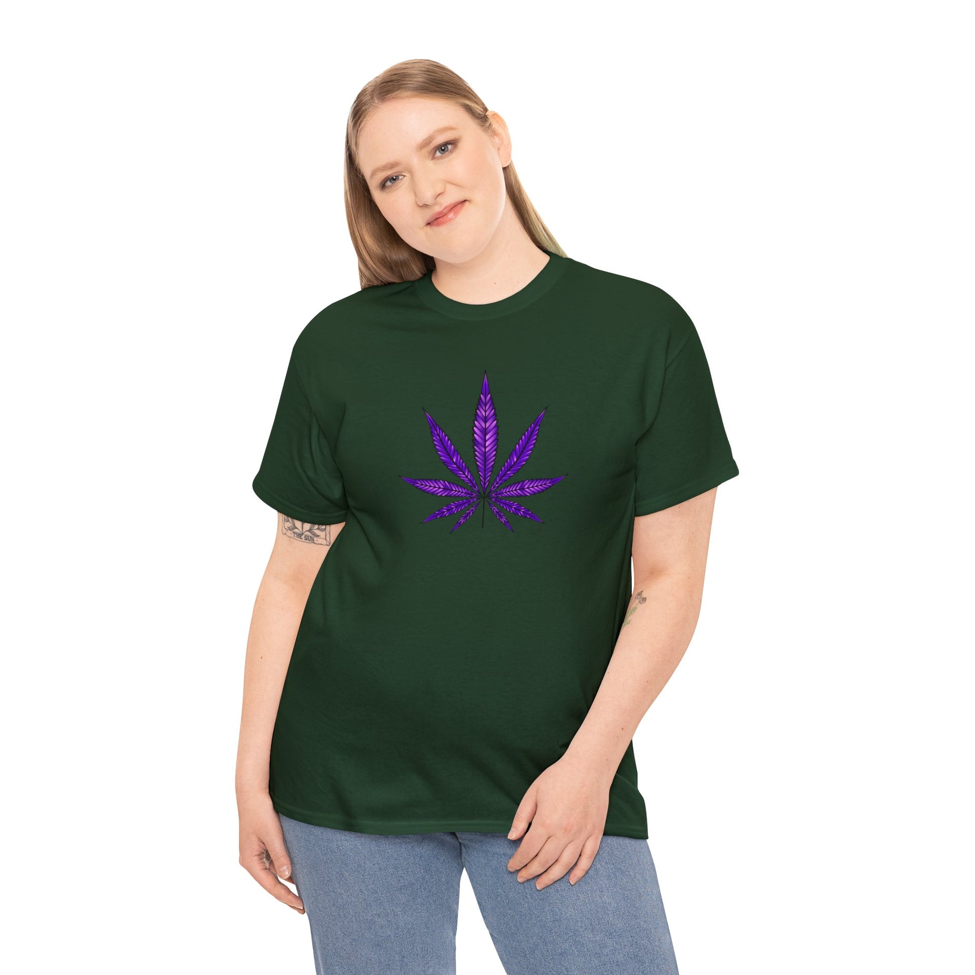 A woman wearing a green t-shirt with a Purple Cannabis Leaf Tee on the front.
