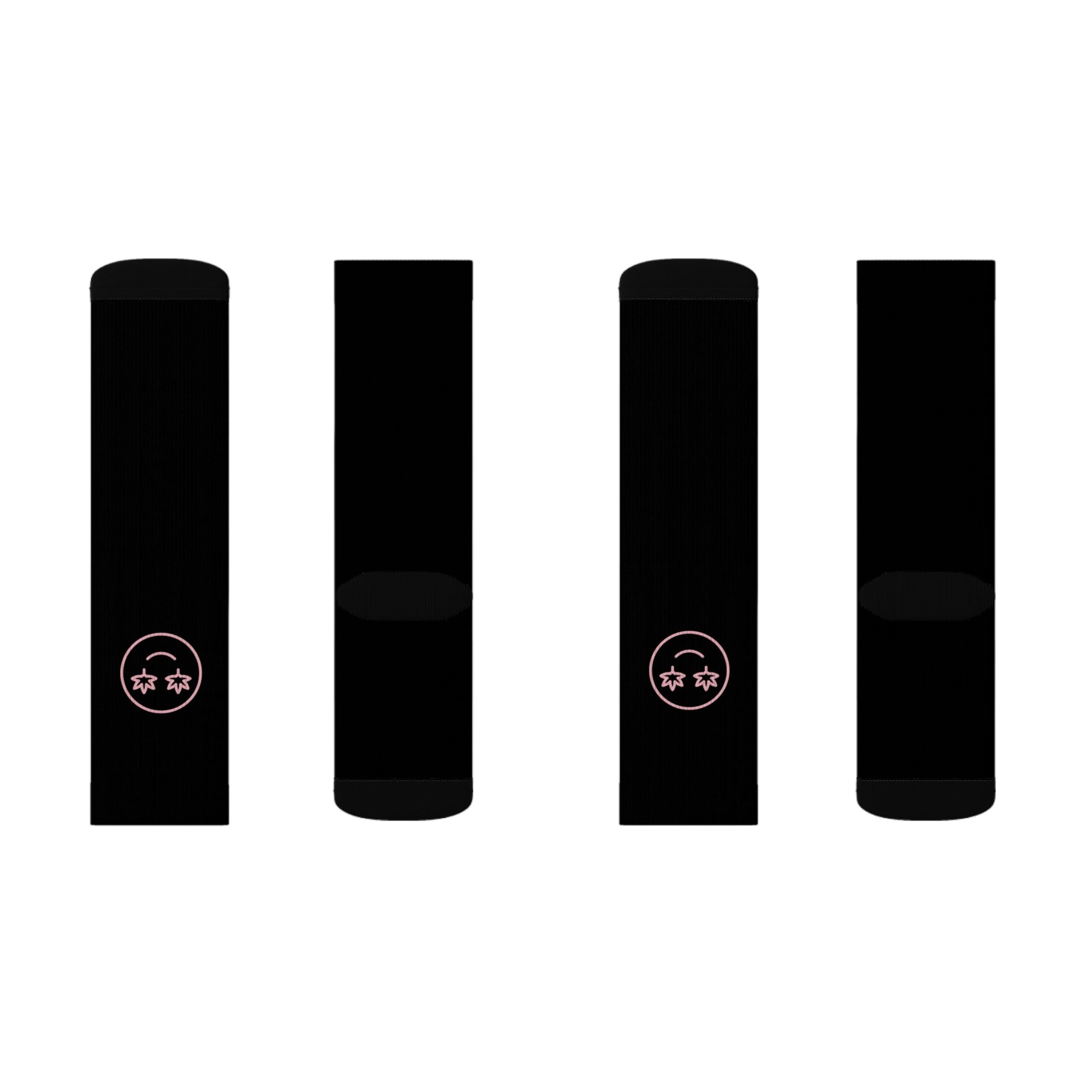 Four black unisex High Stepper Weed Socks are displayed side by side on a white background, with two pairs featuring a small smiling face with star eyes near the top for added style and comfort.
