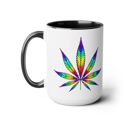 The Vibrant Rainbow Cannabis Mug is a white 15oz ceramic mug with a black handle and rim