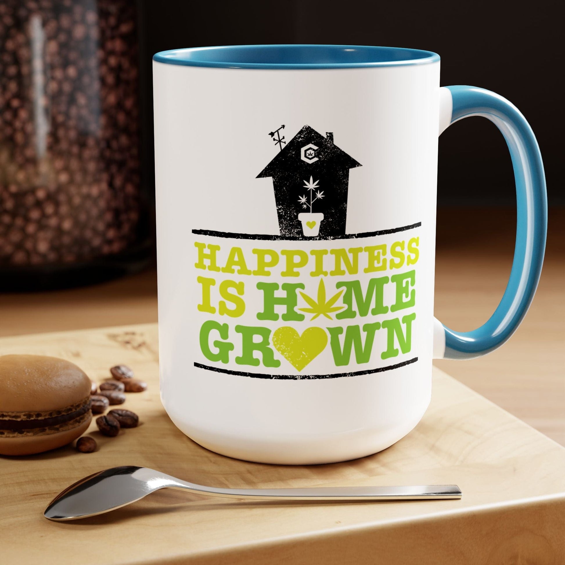 A white ceramic Happiness Is Homegrown Weed Coffee Mug with a blue handle