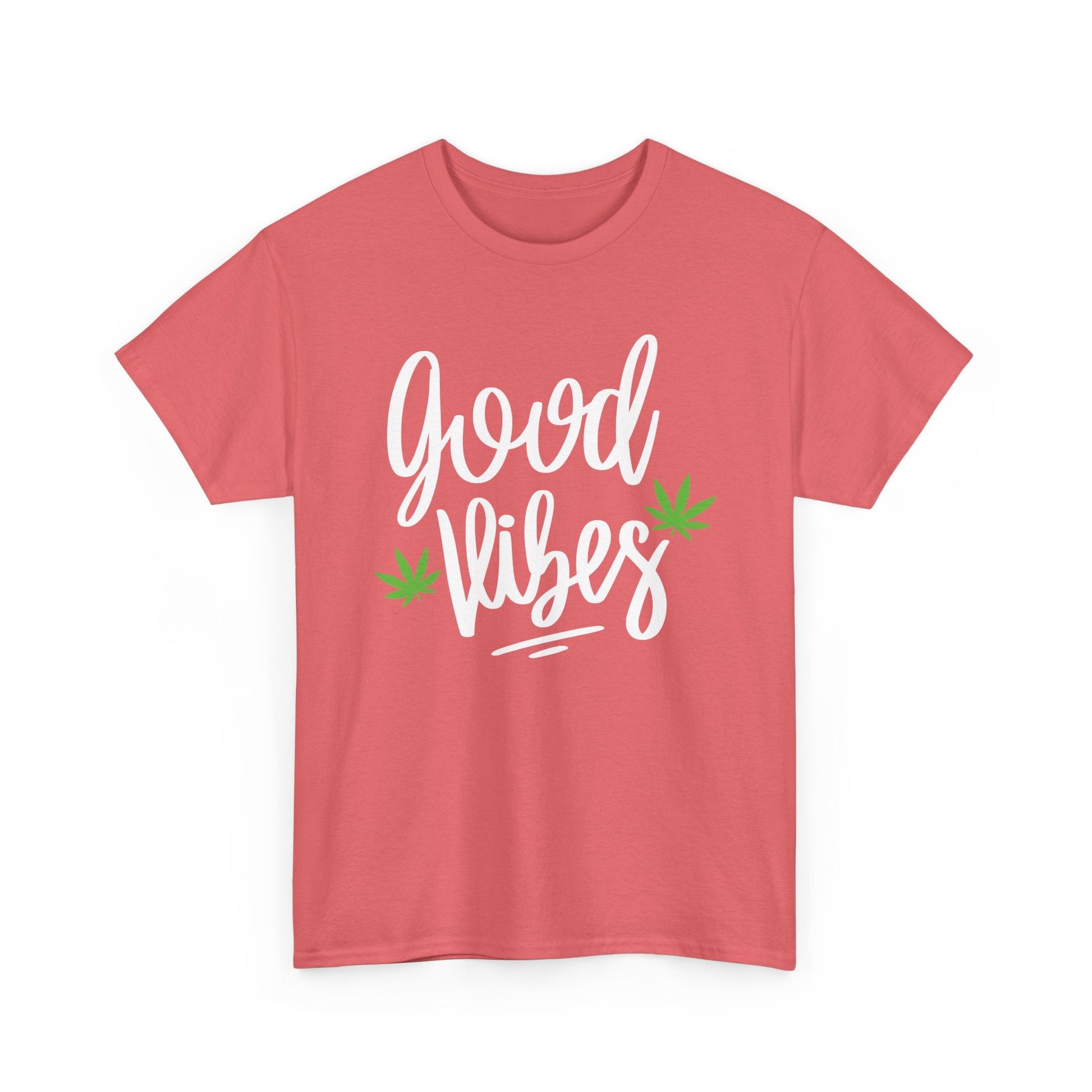 The Good Vibes Marijuana Leaf T-Shirt is a pink tee with "good vibes" in white script and two small green cannabis leaves—perfect for plant lovers and anyone who enjoys a chill vibe.