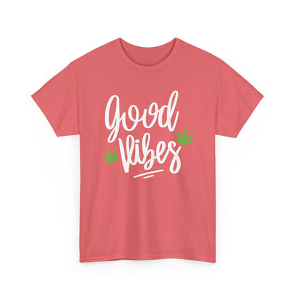 The Good Vibes Marijuana Leaf T-Shirt is a pink tee with "good vibes" in white script and two small green cannabis leaves—perfect for plant lovers and anyone who enjoys a chill vibe.