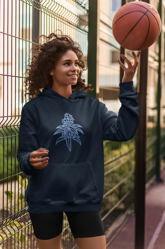 A young woman wearing a blue dream navy blue cannabis hoodie with a basketball in her hand