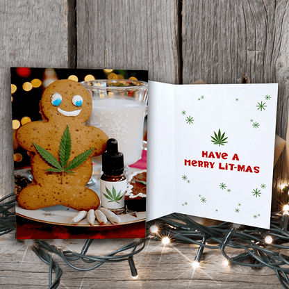 Gingerbread Stoner card on wood shelf sitting on Christmas lights