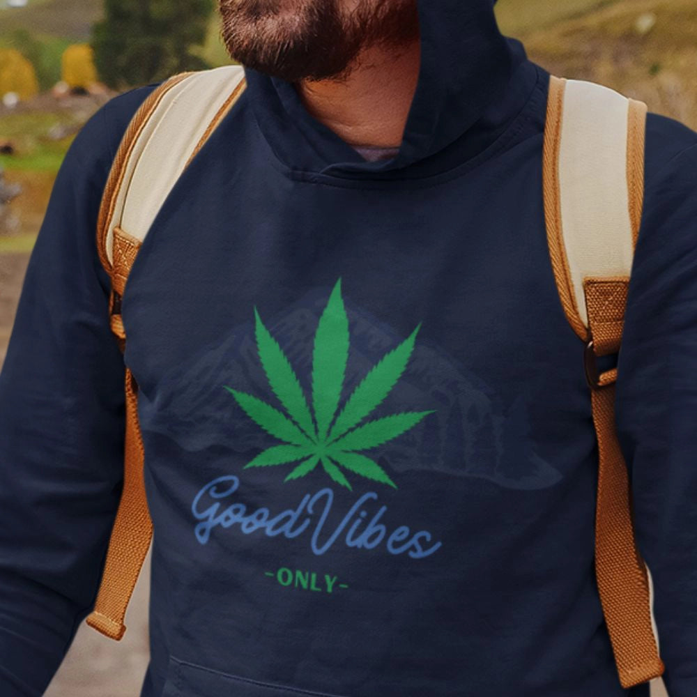 Man wearing a Good Vibes Only Marijuana Mountain Hoodie
