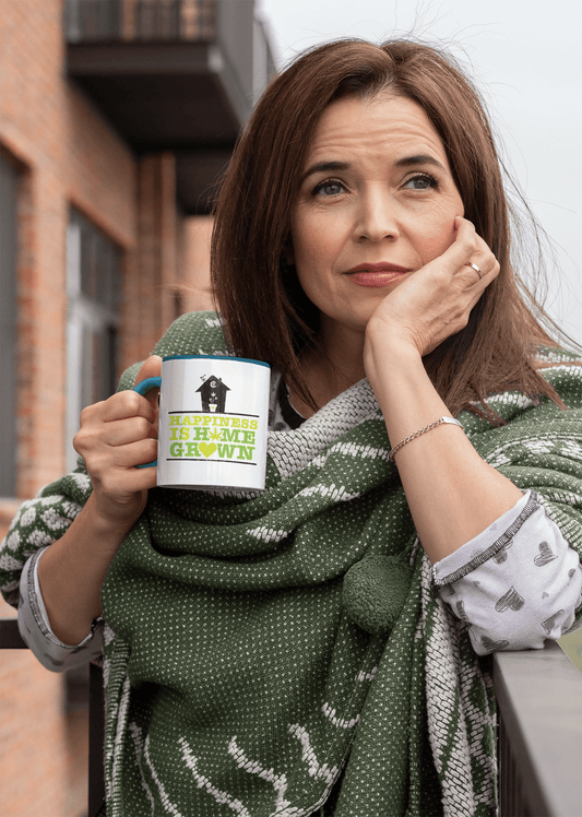 Happiness Is Homegrown coffee mug shown in use