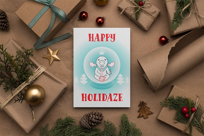 A Happy Holidaze Zen Lion Smoking Bong Merry Christmas Greeting Card reading "happy holidaze" surrounded by wrapped gifts, pine branches, and Christmas ornaments on a beige background, printed on sustainable paper.