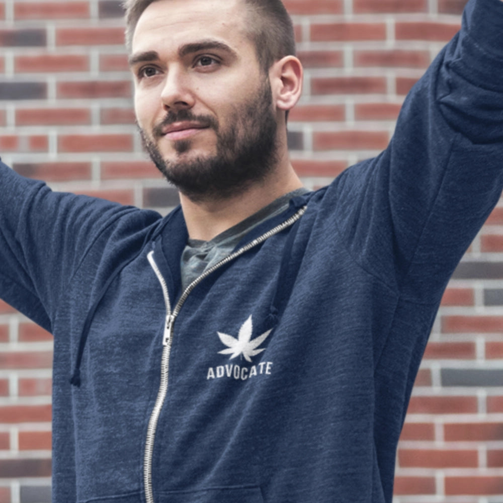 Man wearing a Cannabis Advocate logo on zip up hoodie