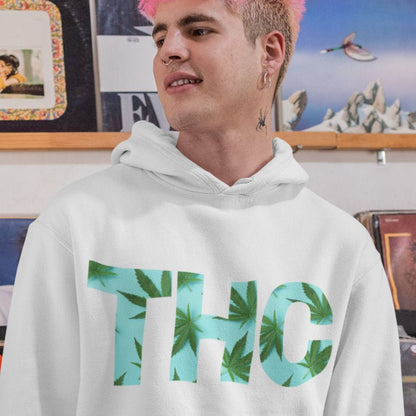 A person with pink hair exudes style in a TTHC Mens Weed Hoodies