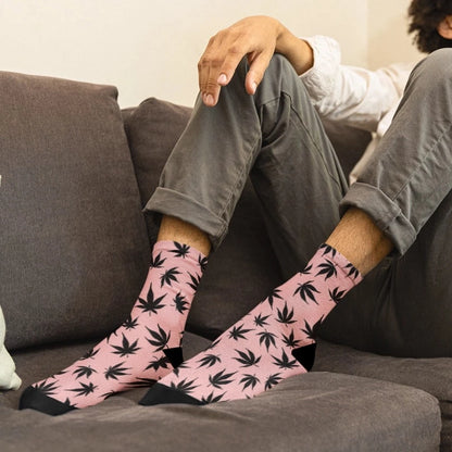 Man wearing black cannabis leaf pink weed socks