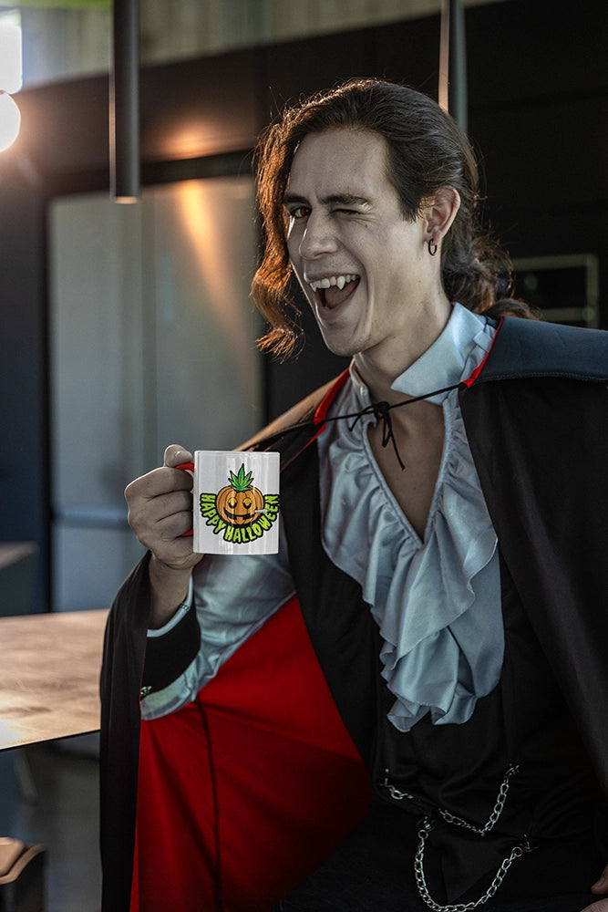 Vampire winking while drinking his favorite drink with his Happy Halloween Stoner Pumpkin