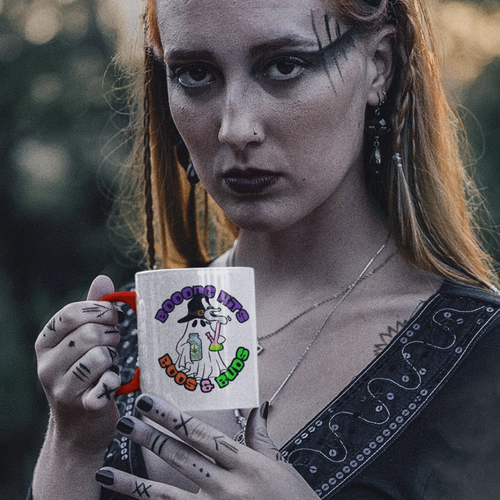 Wiccan Witch in the woods drinking from her Bong Boos and Buds coffee mug closeup