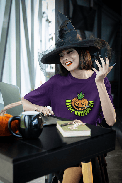 Witch sitting at desk wearing a purple Happy Halloween Pumpkin Stoner Weed Shirt