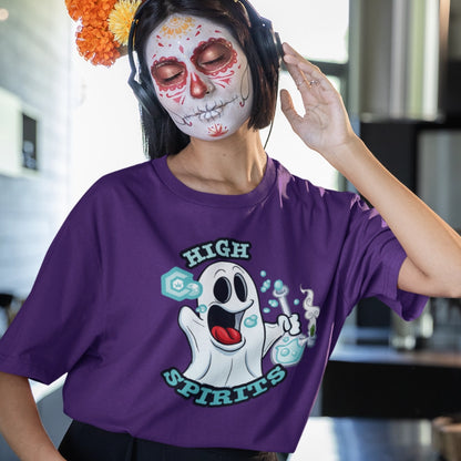 A person in a purple t-shirt with a "High Spirits Ghost with Bong Weed" design, wearing headphones and a day of the dead-style face paint, casually adjusts one earcup.