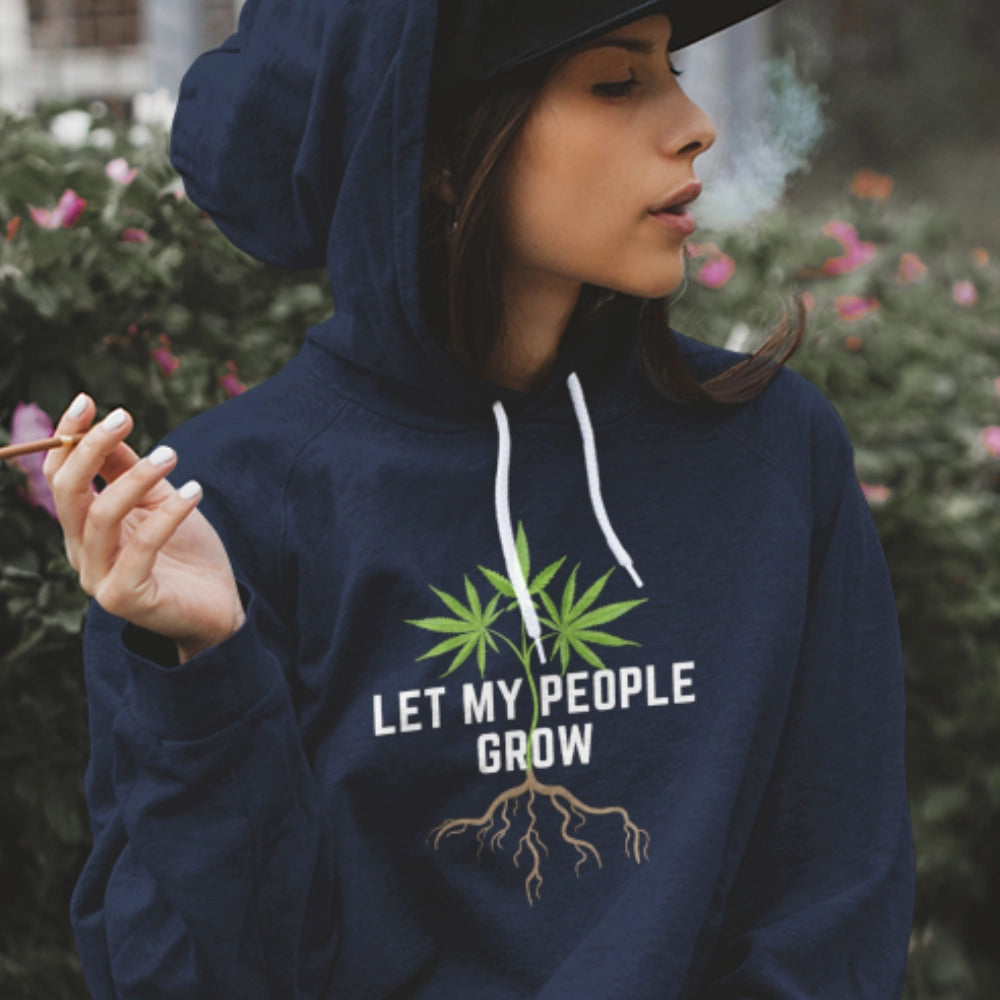 Woman smoking a blunt wearing a Let My People Grow Hoodie