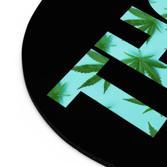 Round black vinyl THC Marijuana mouse pad with a marijuana leaf pattern visible through cut-out sections on a white background.