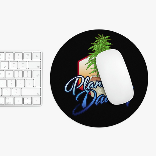 Circular mouse pad featuring a non-slip computer mouse on the right and a white keyboard on the left with a "Cannabis Plant Daddy" sticker on a black background.