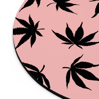 Round Marijuana Leaves Pink Mouse Pad made from high-quality neoprene, partial edge visible on a white background.