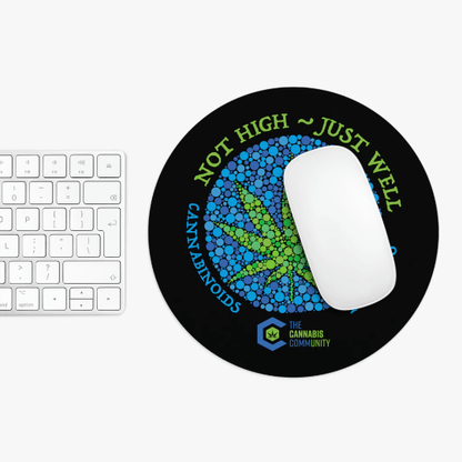 A white computer mouse and keyboard placed on a round, Not High, Just Well Black Mouse Pad